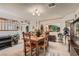 Elegant dining room with a wooden table, seating for six, and decorative furnishings at 5775 W Desert Inn Rd, Las Vegas, NV 89146