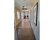 Hallway with tile flooring, natural light, and neutral walls at 5820 W Desert Inn Rd, Las Vegas, NV 89146