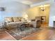 Bright living room shows hardwood floors, traditional furnishings, and neutral color scheme at 625 S Royal Crest Cir # 2, Las Vegas, NV 89169