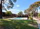 Community pool surrounded by lush landscaping, blue skies and a glimpse of the High Roller at 625 S Royal Crest Cir # 2, Las Vegas, NV 89169