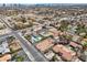 Aerial view of a neighborhood with mature trees and well-maintained properties at 6545 Laredo St, Las Vegas, NV 89146