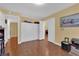 Bright bedroom with modern closet space and hardwood floors at 6611 Ellerhurst Dr, Las Vegas, NV 89103