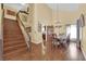Elegant dining room featuring hardwood floors, a chandelier, and classic wood furniture at 6611 Ellerhurst Dr, Las Vegas, NV 89103