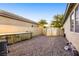 This backyard features a storage area, and is fully fenced-in, offering privacy and security at 7172 Painted Paradise St, Las Vegas, NV 89131