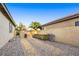 Low maintenance backyard with gravel landscaping and a built in hot tub at 7172 Painted Paradise St, Las Vegas, NV 89131