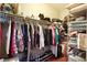 Well-organized walk-in closet with ample hanging and shelving space for clothes and accessories at 7172 Painted Paradise St, Las Vegas, NV 89131