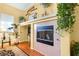 Close-up view of the fireplace with tile surround and decorative mantel at 7172 Painted Paradise St, Las Vegas, NV 89131