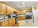 Well-equipped kitchen with granite countertops, stainless steel appliances, and ample cabinet space at 7172 Painted Paradise St, Las Vegas, NV 89131