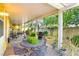 Covered patio with ample seating, perfect for entertaining and enjoying the outdoor space at 7172 Painted Paradise St, Las Vegas, NV 89131