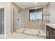 Stylish bathroom with a glass-enclosed shower and contemporary fixtures at 7904 Riviera Beach Dr, Las Vegas, NV 89128