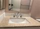 Bathroom featuring a white vanity, sink, and faucet at 8122 Delphi Ct, Las Vegas, NV 89117