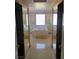 Bathroom featuring a large soaking tub with dual sinks at 8122 Delphi Ct, Las Vegas, NV 89117