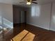Bright bedroom with hardwood floors, ceiling fan, and natural light at 8122 Delphi Ct, Las Vegas, NV 89117