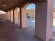 Expansive covered patio featuring sturdy pillars, with backyard shed, offering a great space for outdoor relaxation at 8122 Delphi Ct, Las Vegas, NV 89117