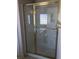 New shower stall with tile and glass door at 8122 Delphi Ct, Las Vegas, NV 89117