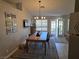 Comfortable dining room featuring a wooden table and modern decor at 824 Holly Lake Way, Henderson, NV 89002