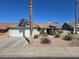 View of a single-Gathering home with desert landscaping and palm trees at 824 Holly Lake Way, Henderson, NV 89002