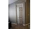 Hallway closet with bi-fold doors and finished trim and gray paint, complements the interior design at 824 Holly Lake Way, Henderson, NV 89002