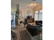 Bright and airy living room with a decorative fireplace and modern furnishings at 824 Holly Lake Way, Henderson, NV 89002