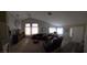 Expansive living area showcasing vaulted ceilings and a comfortable seating arrangement at 824 Holly Lake Way, Henderson, NV 89002
