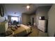 Spacious main bedroom featuring hardwood floors, ceiling fan, and plenty of room to relax at 824 Holly Lake Way, Henderson, NV 89002