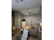 Comfortable bedroom with ceiling fan, ample closet space, and stylish decor at 824 Holly Lake Way, Henderson, NV 89002