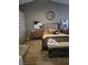 Inviting bedroom with hardwood floors, ceiling fan, and a peaceful atmosphere at 824 Holly Lake Way, Henderson, NV 89002
