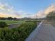 A well manicured neighborhood park with walking trail at 824 Holly Lake Way, Henderson, NV 89002