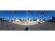 Wide street view of homes with desert landscaping in a suburban neighborhood at 824 Holly Lake Way, Henderson, NV 89002