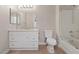 Well-maintained bathroom with white vanity, mirror, and glass-enclosed shower at 9050 W Warm Springs Rd # 1093, Las Vegas, NV 89148