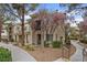 Beautiful multi-story condo with balcony, desert landscaping, and sidewalk at 9050 W Warm Springs Rd # 1093, Las Vegas, NV 89148