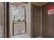 Inviting outdoor patio space featuring a gated area, and exterior door offering access to storage and utilities at 9050 W Warm Springs Rd # 1093, Las Vegas, NV 89148