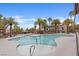 Sparkling community pool surrounded by palm trees and comfortable lounge areas providing a tranquil and refreshing escape at 9050 W Warm Springs Rd # 1093, Las Vegas, NV 89148