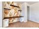 Home office features a custom desk, decorative shelving, and modern design elements at 9380 Lunar Effect St, Las Vegas, NV 89143