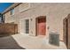 Private backyard features an open patio and stucco wall surround at 10115 Tree Bark St, Las Vegas, NV 89183