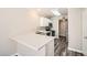 Bright kitchen with white cabinets and counterspace and stainless steel appliances at 10115 Tree Bark St, Las Vegas, NV 89183