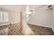 Bright living room features hardwood floors and a light-filled stairwell at 10115 Tree Bark St, Las Vegas, NV 89183