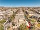 Lovely home with a private backyard, covered patio, and a rooftop deck offering stunning neighborhood views at 10490 Palmadora St, Las Vegas, NV 89178