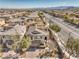 Beautiful two-story home featuring a tile roof, desert landscaping, and a two-car garage at 10490 Palmadora St, Las Vegas, NV 89178