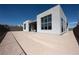 Spacious backyard area with ample space for outdoor living and modern architecture at 10921 Rossa Peak Ave, Las Vegas, NV 89135