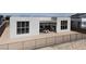 Modern home featuring a fenced backyard, patio, and minimalist landscaping at 10921 Rossa Peak Ave, Las Vegas, NV 89135