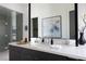 Close-up of bathroom vanity with double sinks and elegant decor at 10921 Rossa Peak Ave, Las Vegas, NV 89135