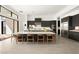Spacious kitchen with island seating, sleek cabinets, and stainless steel appliances at 10921 Rossa Peak Ave, Las Vegas, NV 89135