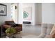 Bright living area showcasing contemporary art and comfortable seating in an open layout at 10921 Rossa Peak Ave, Las Vegas, NV 89135
