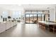 Open living area with large windows, patio access, and lots of natural light at 10921 Rossa Peak Ave, Las Vegas, NV 89135