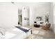 Serene main bedroom boasts ample natural light and stylish decor at 10921 Rossa Peak Ave, Las Vegas, NV 89135
