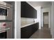 Walk-in pantry with custom shelving and ample storage space at 10921 Rossa Peak Ave, Las Vegas, NV 89135