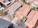 Aerial view showcasing tile roofs and a sparkling swimming pool in the backyard at 11028 Meadow Leaf Ave, Las Vegas, NV 89144