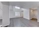 Bright, spacious living area with soaring ceilings and modern floors provides a comfortable open space at 11028 Meadow Leaf Ave, Las Vegas, NV 89144