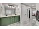 Bathroom features a double vanity and connects to the bedroom and walk-in closet at 11157 Mezzana St, Las Vegas, NV 89141